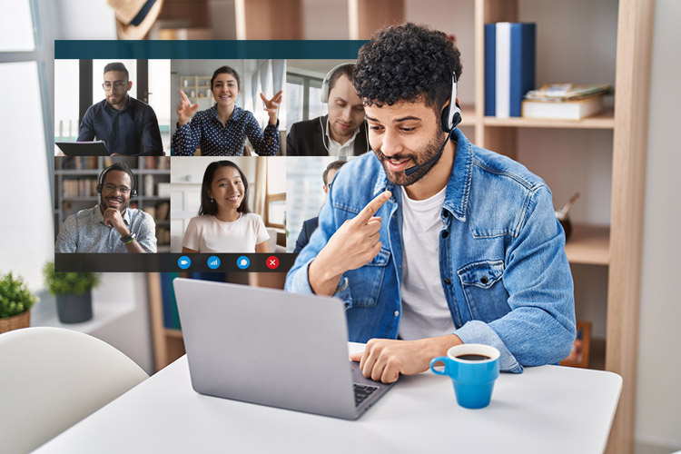 man pointing to himself while having a conference call