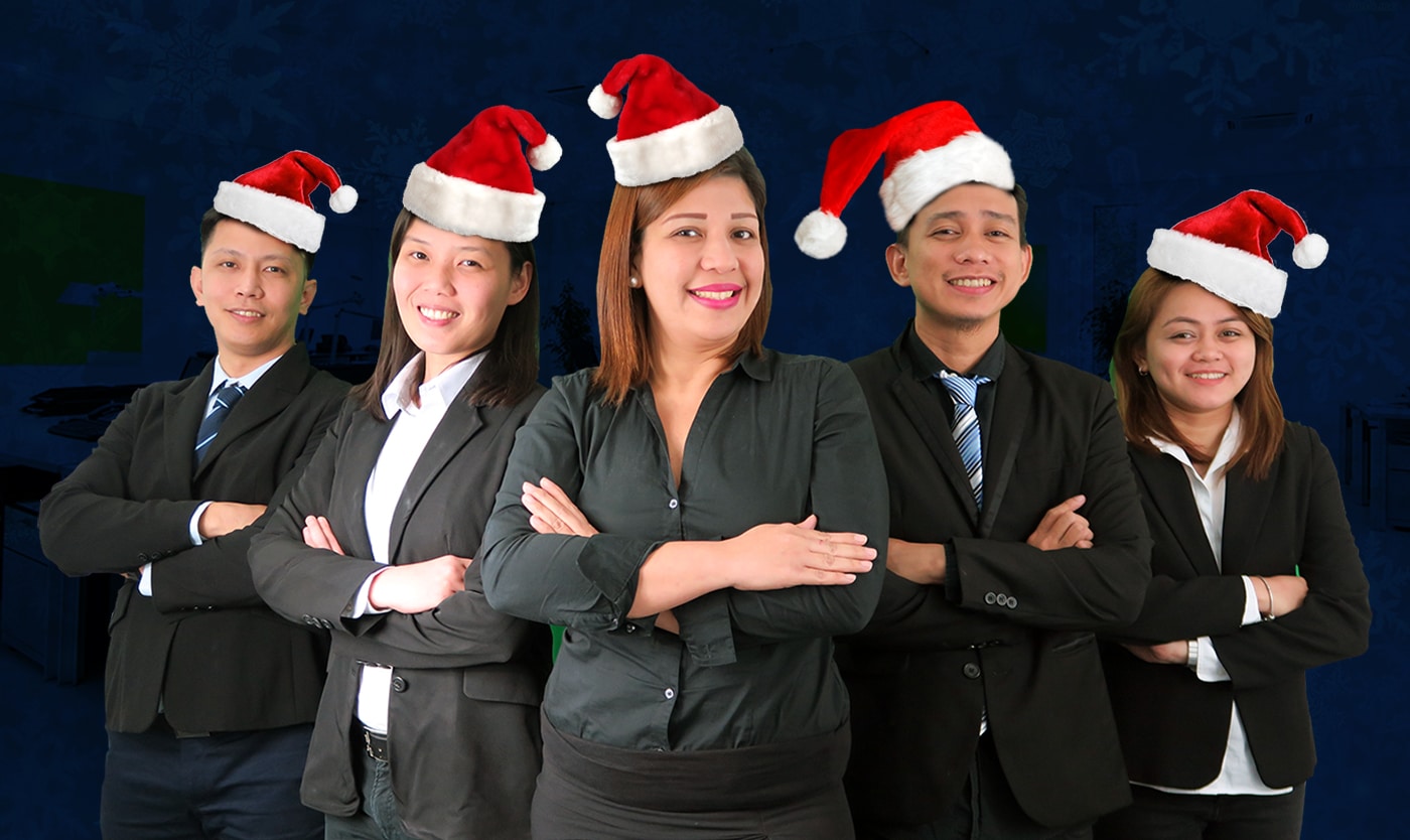 The employees are wearing Christmas hats.