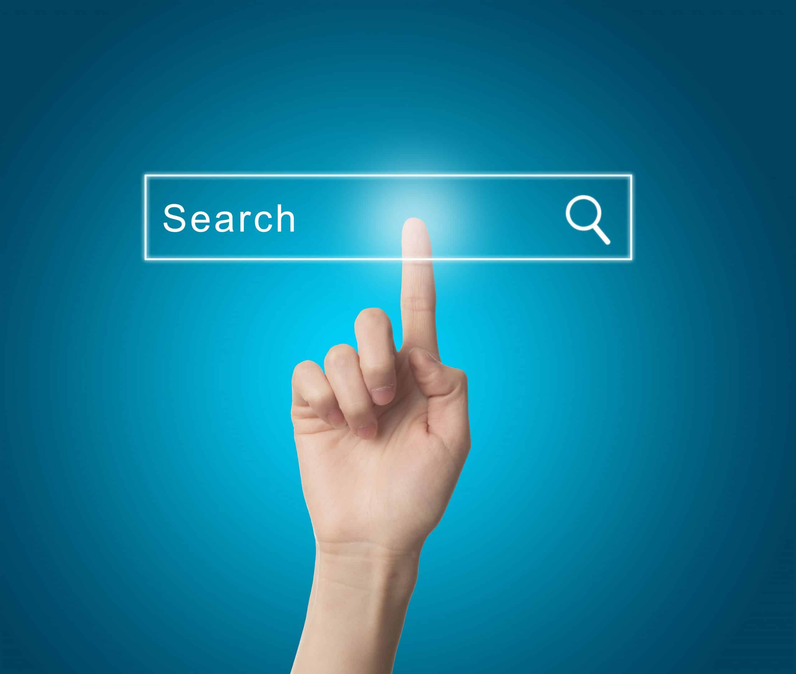 A finger pressing a digital search bar on a blue background, with the word 'Search' inside the bar