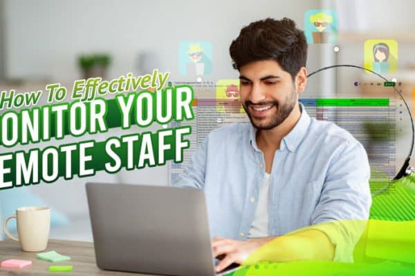 man wearing white smiling while typing on his laptop