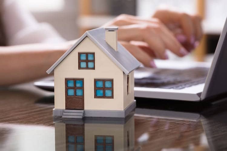 A miniature house reflecting real estate virtual secretary Philippines experts.