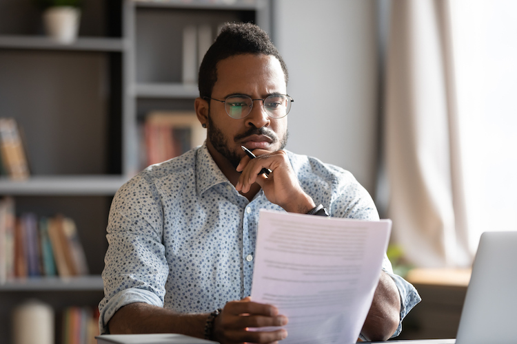 Man reading a resume