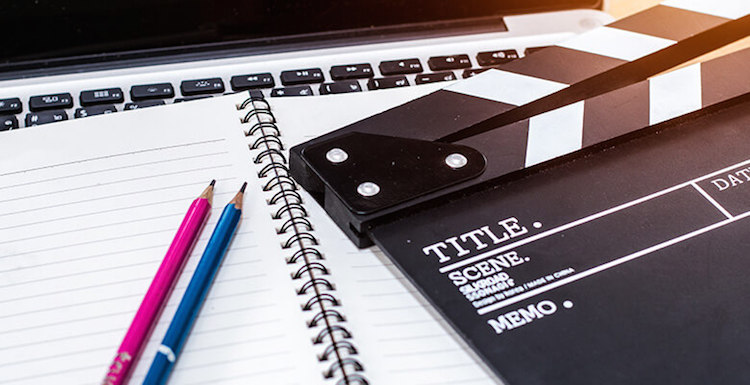 clapperboard on a notebook