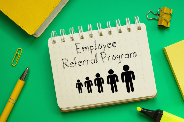 Employee Referral Program is shown on a business photo 