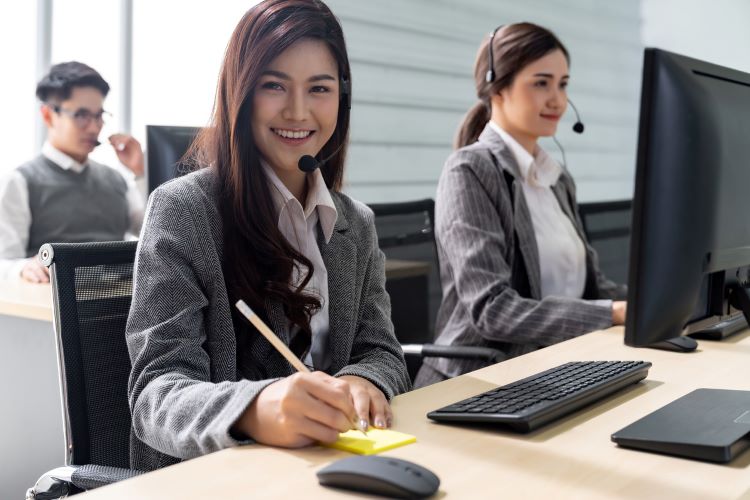 women working in front of computers