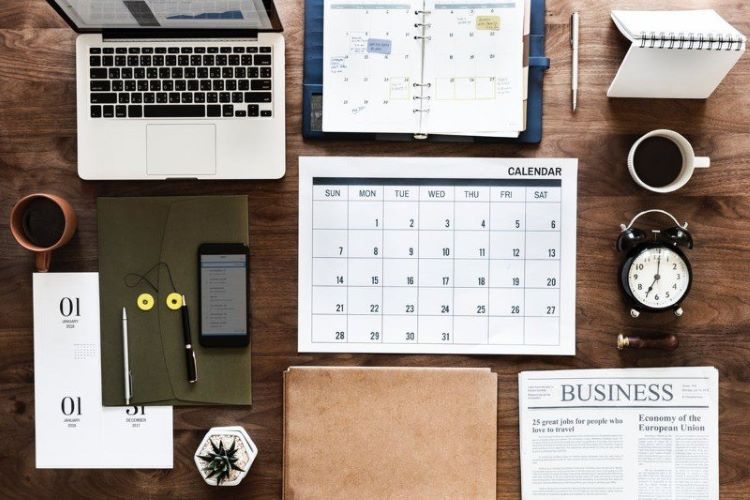 organized office supplies and equipment on a desk