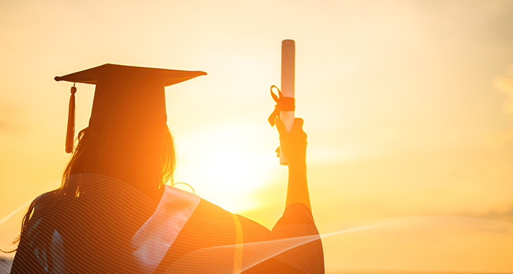 woman holding a diploma